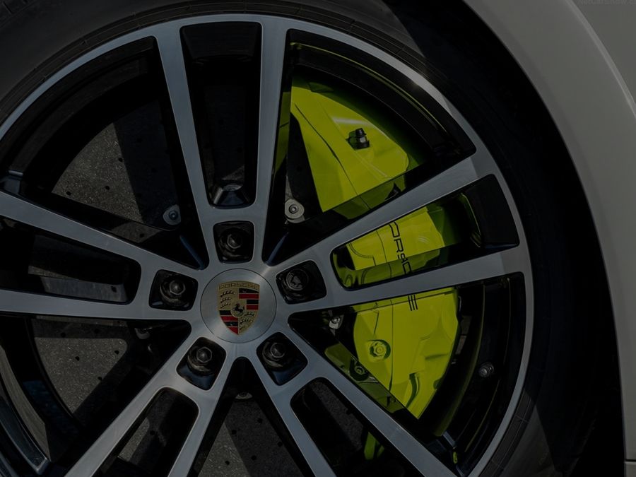 Porsche Cayenne alloy wheel with acid green brake calliper